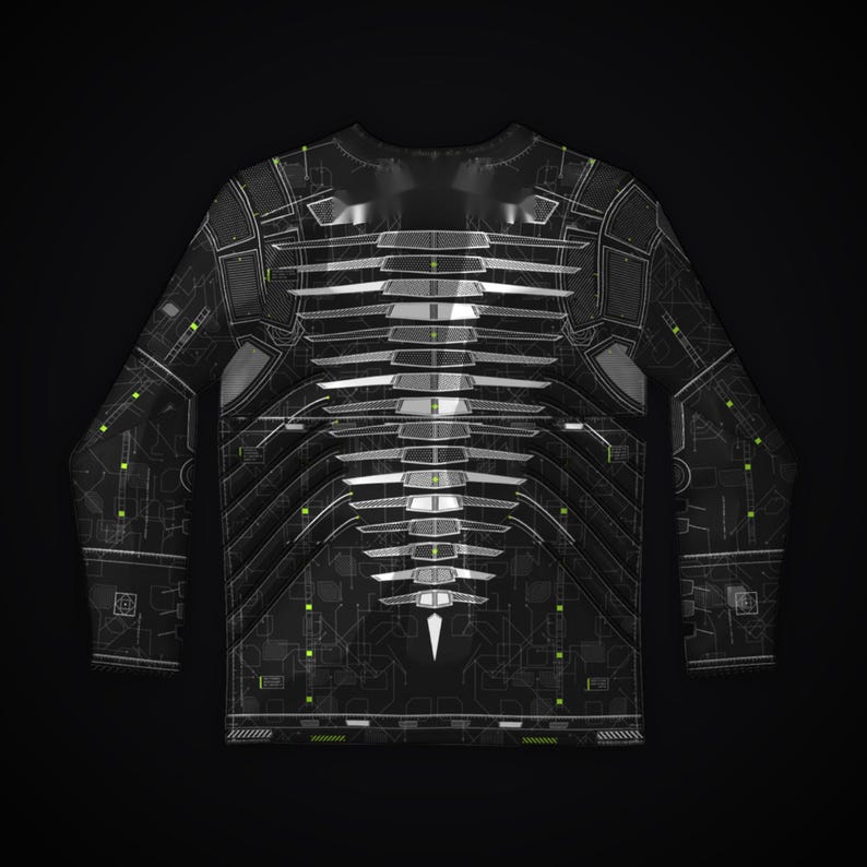 Puede incluir: Una camiseta de manga larga con un patr&oacute;n de esquema t&eacute;cnico en negro y gris oscuro. El dise&ntilde;o incluye una columna central vertical de formas blancas segmentadas similares a costillas con peque&ntilde;os acentos verde ne&oacute;n.
