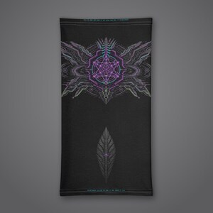 May include: A black neck gaiter featuring a central purple geometric star design surrounded by intricate cybernetic patterns. Below the main graphic is a single dark leaf-like shape. Small blue text is printed at the top and bottom edges.