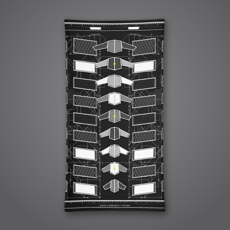 May include: A black neck gaiter featuring a white technical blueprint design with repeating geometric shapes, rectangular frames, and small lime green accents. The bottom edge includes the text JEZERO 77 ASGDE DELTA / SOL 0001.