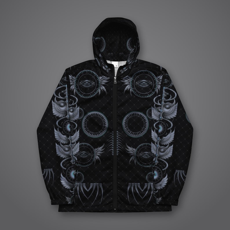 May include: A black zip-up hooded jacket featuring a repeating pattern of grey winged eyes, circular geometric motifs, and a subtle diamond grid texture. The garment includes a full-length front zipper, long sleeves, and a hood with a matching print.