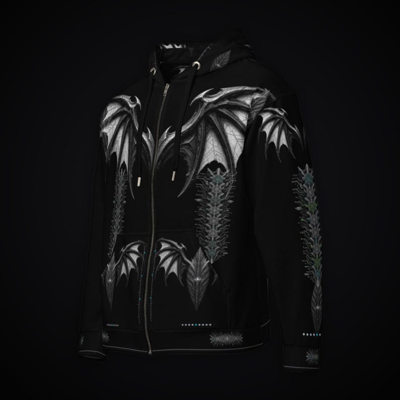 May include: A black zip-up hoodie featuring a white graphic print of large bat-like wings across the chest and shoulders, with intricate vertical spinal patterns running down the front and sleeves, and a drawstring hood with silver aglets.