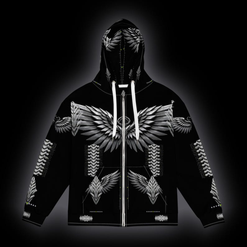 May include: A black zip-up hoodie featuring a white graphic print of large feathered wings across the chest and hood. The design includes symmetrical wing patterns on the sleeves and torso, with white drawstrings at the neck and a full-length zipper.