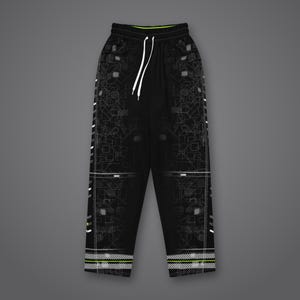 May include: Black sweatpants featuring a white geometric circuit-board pattern, a neon green inner waistband, and white drawstring cords. The sides and cuffs are accented with white diagonal striped lines and neon green horizontal trim.