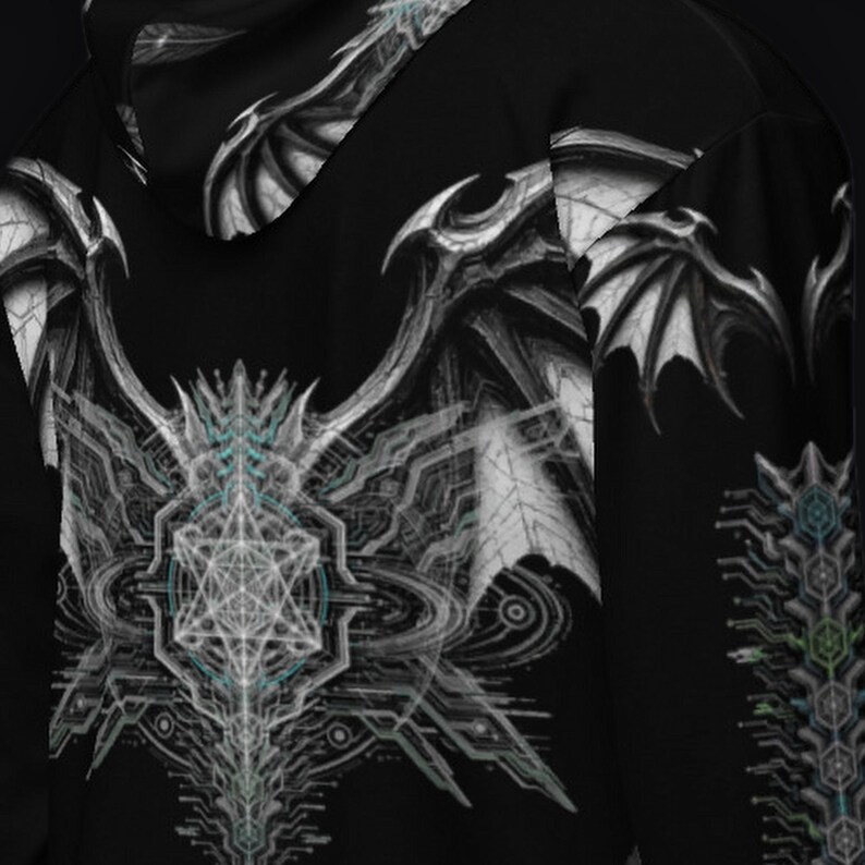 May include: A black long-sleeve hooded sweatshirt featuring a large, intricate white and gray graphic of dragon wings and a geometric star pattern on the back. The design includes detailed mechanical lines and subtle blue accents throughout the print.