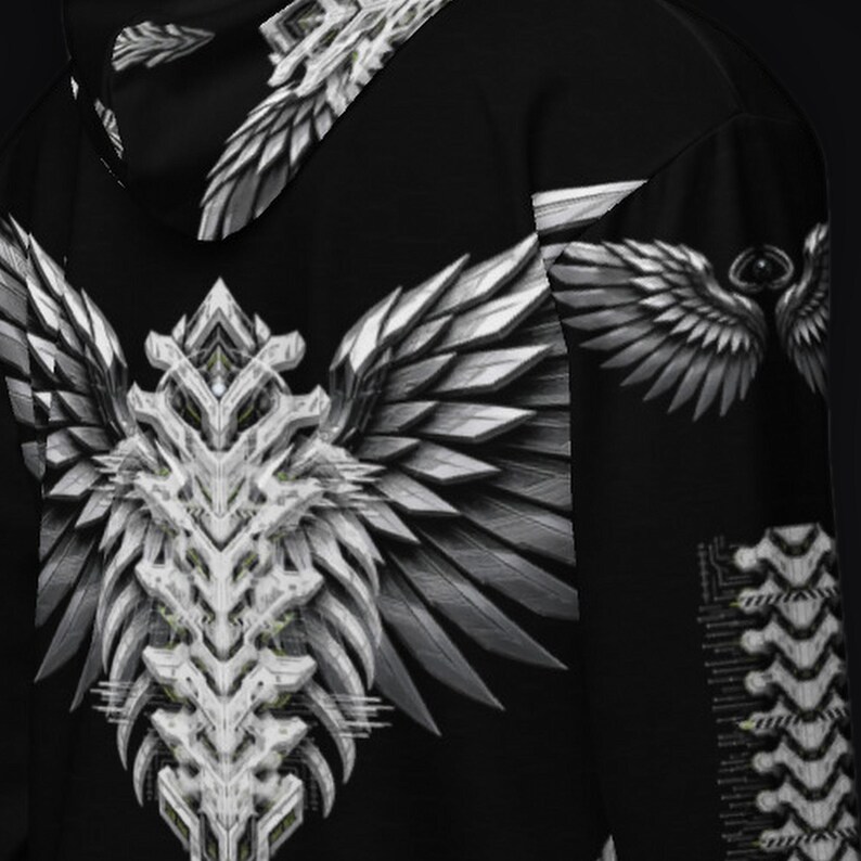 May include: A black hoodie featuring a large, white, mechanical-style wing graphic on the back. The design includes intricate, layered, metallic-looking feathers and a central spine-like structure. A smaller wing motif is visible on the sleeve.