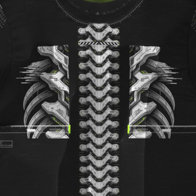 May include: A black t-shirt featuring a white and gray graphic print of a mechanical spine and rib cage. The design includes technical line details, a horizontal measuring scale across the chest, and subtle yellow accents on a dark background.