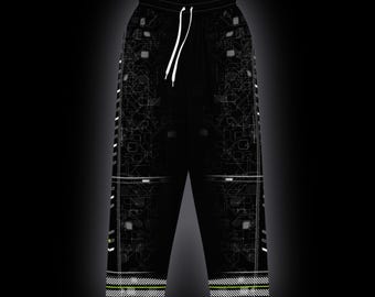 May include: Black sweatpants featuring a white geometric circuit-board pattern, a neon green inner waistband, and white drawstring cords. The legs have white side-stripe detailing and horizontal white line accents at the cuffs.