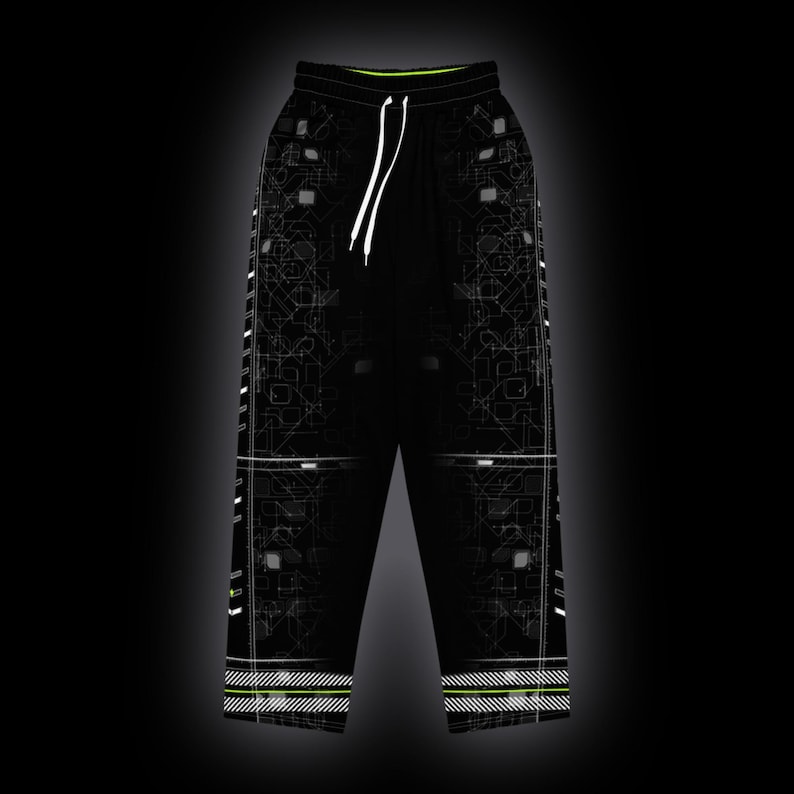 May include: Black joggers featuring a white geometric circuit-board pattern, a neon green inner waistband, and white drawstring cords. The legs have white side-stripe detailing and horizontal white line accents at the cuffs.