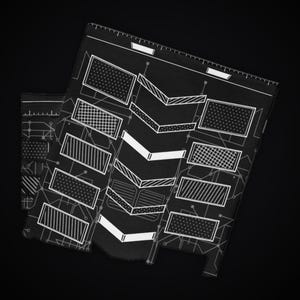 May include: A black rectangular sheet featuring a white technical blueprint design. The pattern includes various geometric shapes, including rectangles with dot and cross-hatch textures, and a central column of stacked chevron arrows.