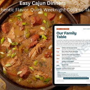 May include: A cast iron pot filled with brown Cajun gumbo containing sausage, chicken, and green onions, next to a digital tablet displaying a meal plan titled Our Family Table with a list of recipes for Monday through Friday.