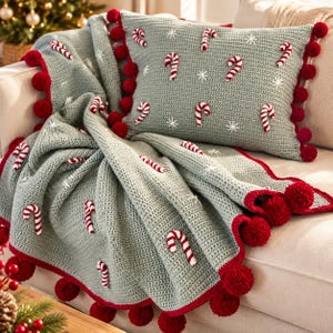 Patroon voor een gehaakte deken met snoepstokmotief en een set kerstkussens (PDF), feestelijke plaid met pomponrand, feestelijke woondecoratie