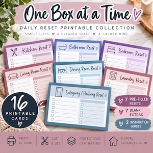 May include: A collection of 16 printable cards titled One Box at a Time Daily Reset Printable Collection. The cards feature checklists for Kitchen, Bathroom, Bedroom, Living Room, Dining Room, Laundry, and Entryway/Hallway resets with icons.