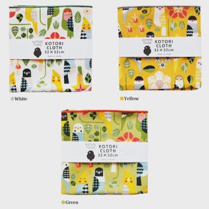 May include: Three square Kotori Cloths measuring 32 x 32 cm, each featuring a bird and floral pattern. The cloths come in white, yellow, and green colorways, with a paper band around the center of each displaying the text Kotori Tachi.