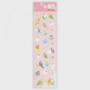 May include: A sheet of stickers featuring colorful cartoon birds and floral accents on a pink background. The stickers include various bird species in different poses, with some stickers showing pairs of birds. The stickers are designed for crafts and decoration.