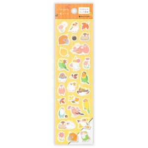 May include: A sheet of decorative stickers featuring various colorful bird illustrations, flowers, and leaves. The stickers are on a yellow background with Japanese text at the top. The stickers are in various shapes and sizes.