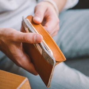 Sophisticated Brown Leather iPhone 15 Wallet: Card Slot, Secure Cap Closure, Natural Wool Felt, Minimalist Design, Premium Leather Carrier image 8