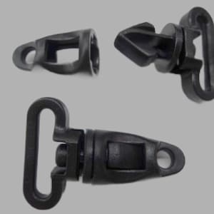 May include: Black plastic swivel clips in various configurations. The image shows three separate pieces, including a complete clip with a D-ring, a detached male component, and a female component.
