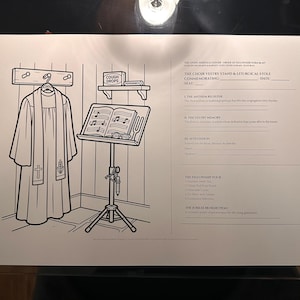 May include: A white paper print featuring a black line drawing of a choir robe on a wall hook, a music stand with an open book, and a shelf with cough drops. The right side contains printed text forms titled The Choir Vestry Stand & Liturgical Stole.