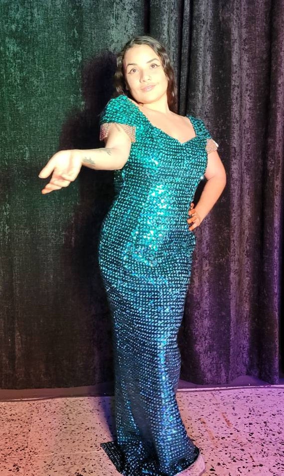 Enchanting Shimmer: Portia and Scarlett's Iridescent Sequin Gown for Unforgettable Nights