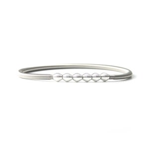 Thick Guitar Silver String Bracelet with white coiled beads,Beaded Spring bracelet,Stainless Steel string, flexible stertch