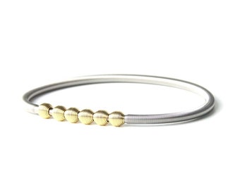 Thick Guitar Silver String Bracelet with gold coiled beads,Beaded Spring bracelet,Stainless Steel string, Coiled bracelet Silver Elastic