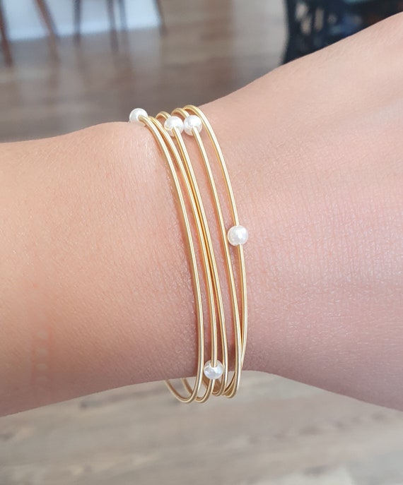 Buy Guitar String Bracelet With White Pearl,spring Coil Bracelet,stainless  Steel String Pearl,bracelets Stretchy Stainless-steel Strings Online in  India - Etsy