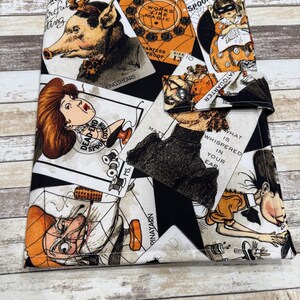 May include: A fabric cover featuring a collage of vintage-style illustrations, including a pig, a person with red hair, and text such as "Works Like Magic," "Dead-End Spool Cotton," and "What is whispered in your ear." It has a snap fastener closure.