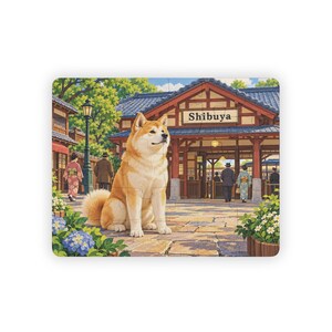 May include: A jigsaw puzzle featuring a tan and white Akita dog sitting in front of a train station building with a sign that reads Shibuya. The scene includes people in traditional clothing, a street lamp, and blue and white flowers.
