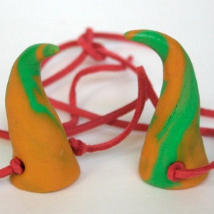 Cosplay demon horns handcrafted in green and orange polymer clay