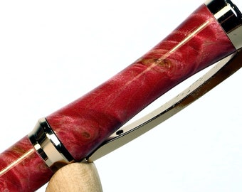 Pink Wood Pen with swirling grain and gold setting