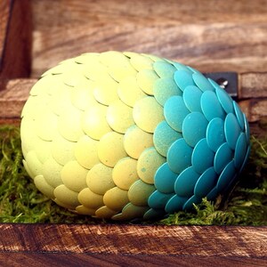 Teal Dragon Egg fades to yellow