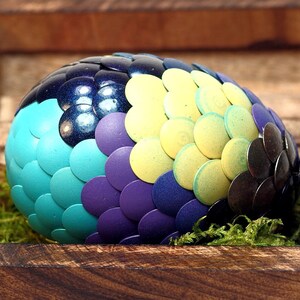 Calico Dragon Egg features multi-color scales
