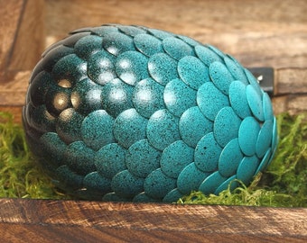 Teal Dragon Egg fades to black