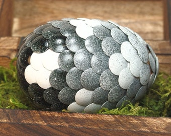 Grey Dragon Egg fades to black