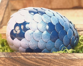L'œuf de dragon bleu se transforme en lavande