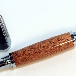 Mahogany wood pen in chrome and black setting