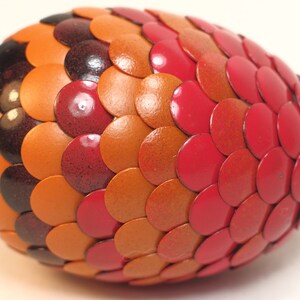 Red Dragon Egg fades to orange and black stripes image 2