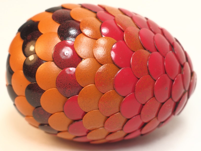 Red Dragon Egg fades to orange and black stripes image 2