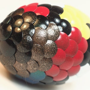 Calico Dragon Egg features multi-color scales image 4