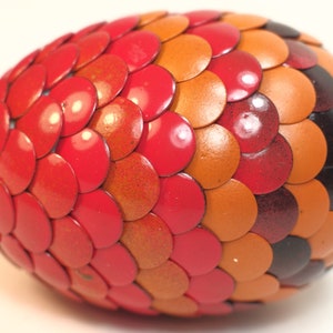 Red Dragon Egg fades to orange and black stripes image 5