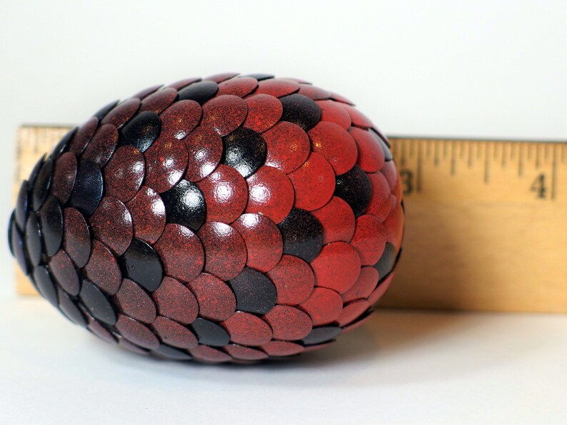 Calico Dragon Egg features multi-color scales image 9