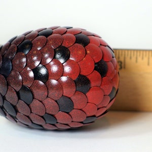 Red Dragon Egg fades to orange and black stripes image 9