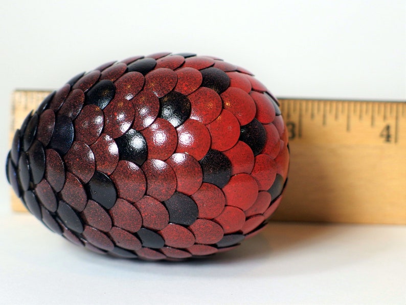 Red Dragon Egg fades to orange and black stripes image 9