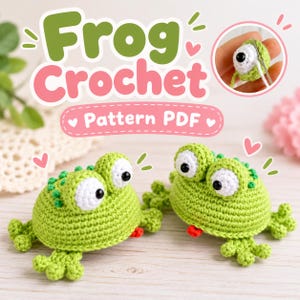 May include: Two green crocheted frogs with large white eyes and black pupils, featuring small red tongues. The text "Frog Crochet Pattern PDF" is displayed above the frogs, with an inset showing a close-up of a crochet needle and yarn.