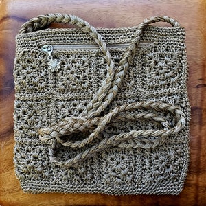 double pocket purse, braided strap, lined pockets, crochet nylon sand