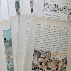 May include: A collection of vintage children's books with aged, off-white pages. The covers feature illustrations and text, including the title "In the Nursery" and a psalm. The pages show signs of wear, suggesting their age and use.