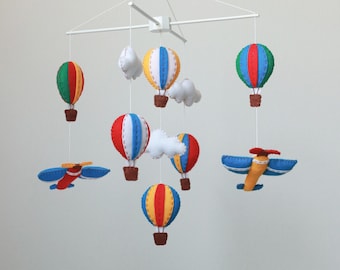 Primary colors hot air balloons and airplanes baby mobile, colorful nursery decor.