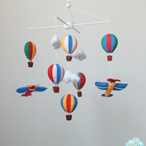 Primary colors hot air balloons and airplanes baby mobile, colorful nursery decor.