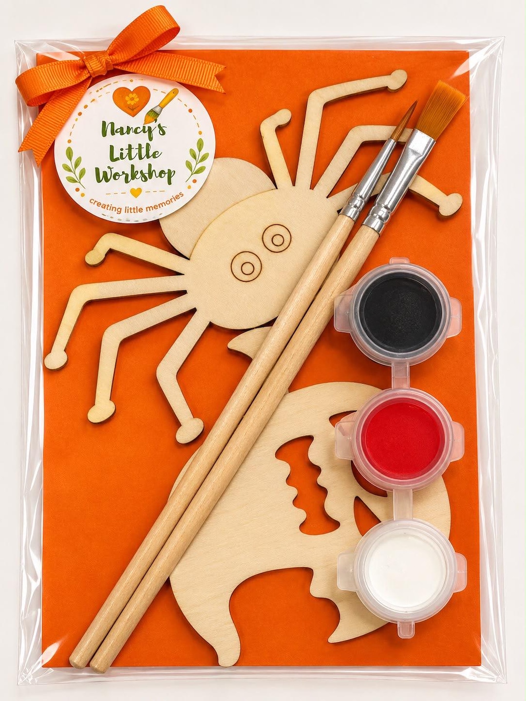 Halloween mini craft kit with a wooden spider and ghost, two paintbrushes and three paint pots