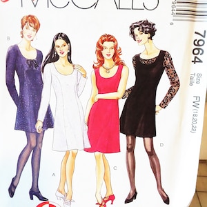 May include: A sewing pattern for a dress with four different styles. The pattern is for sizes 18, 20, and 22. The pattern is called "Easy McCall's" and the pattern number is 7964. The pattern is for a 2-hour dress.